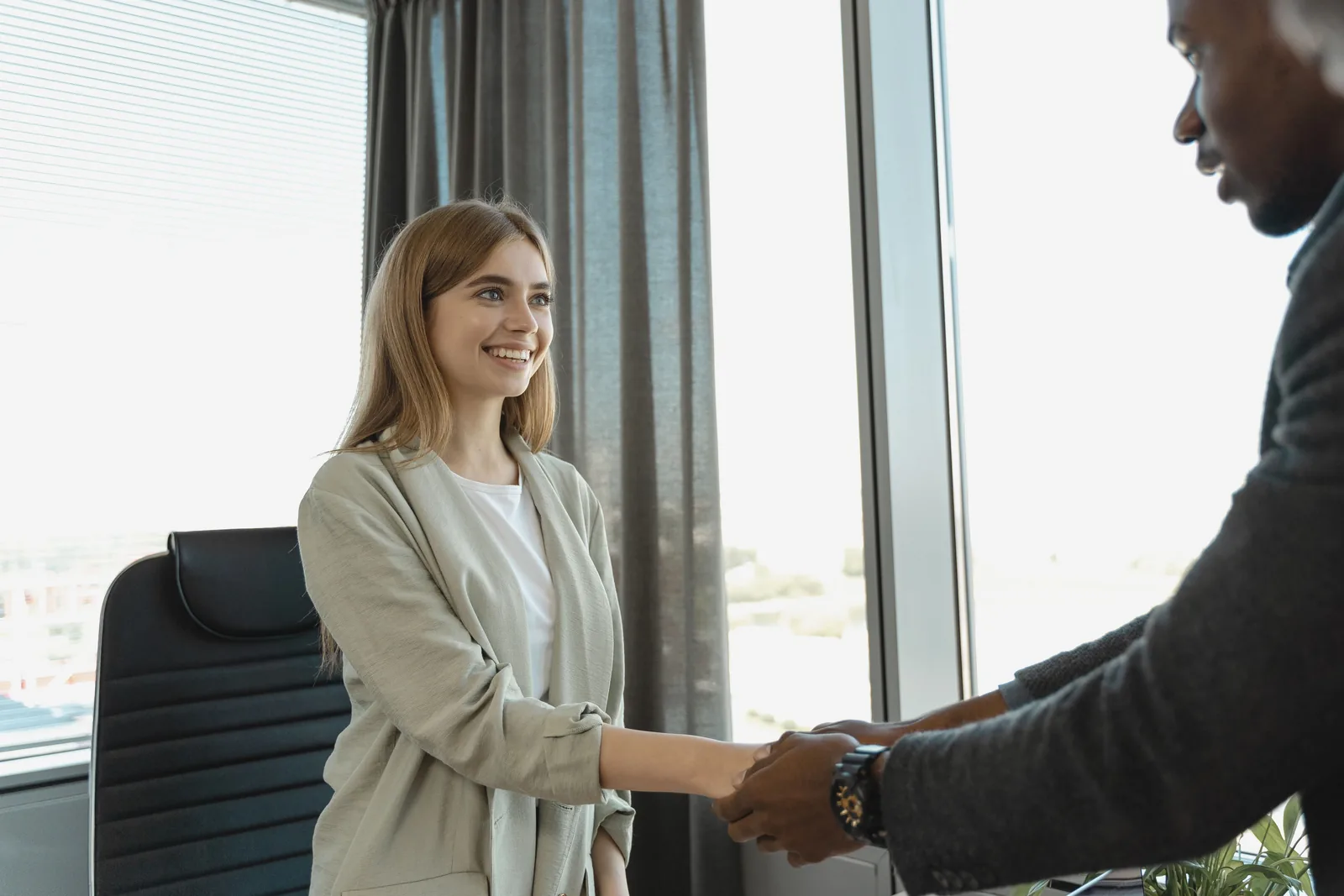 A successful handshake after a professional interview