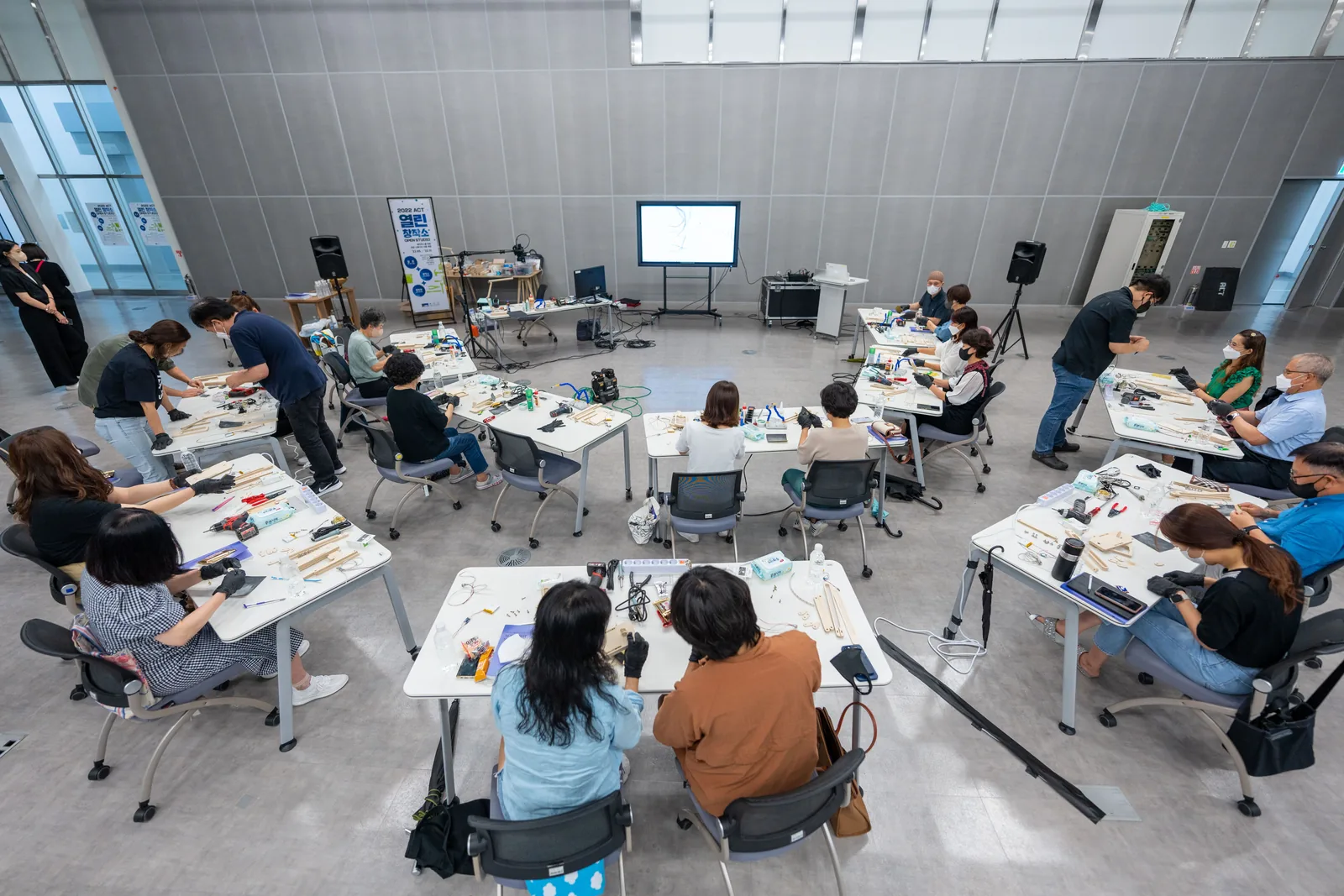 Students participating in a high-technology workshop